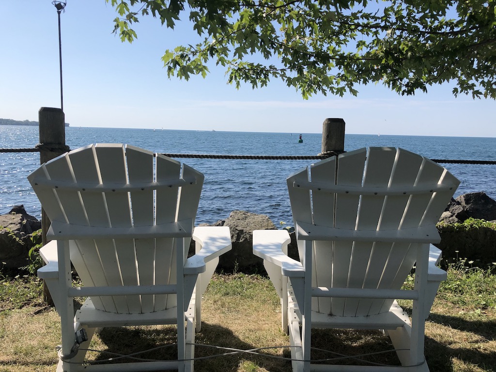 Muskoka chairs and lake view